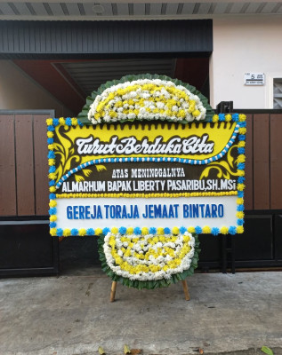 Papan Bunga Duka di 15 Ilir